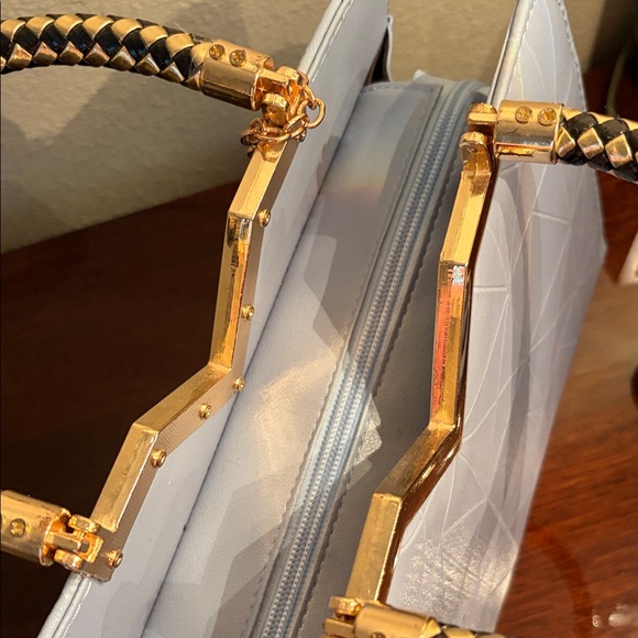 Elegant White Handbag with Gold Accents - Picture 10 of 17